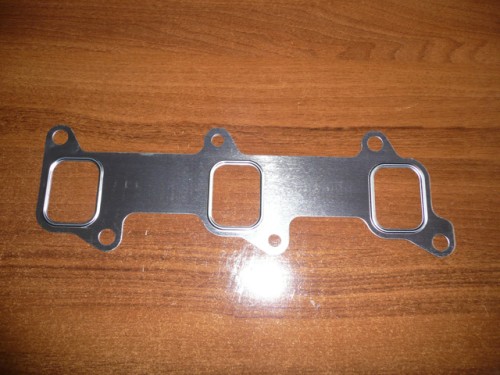 Uszczelka pod kolektor wydechowy Ford New Holland 83981486 E8NN9448AA